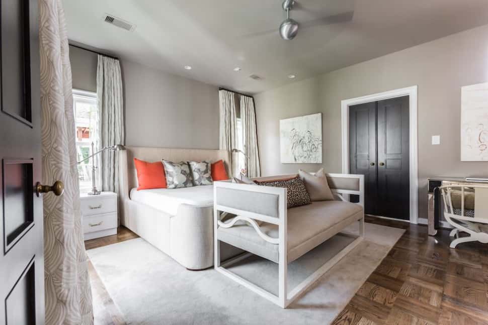 Sophisticated master bedroom in neutral color palette designed by Laura U Interior Design